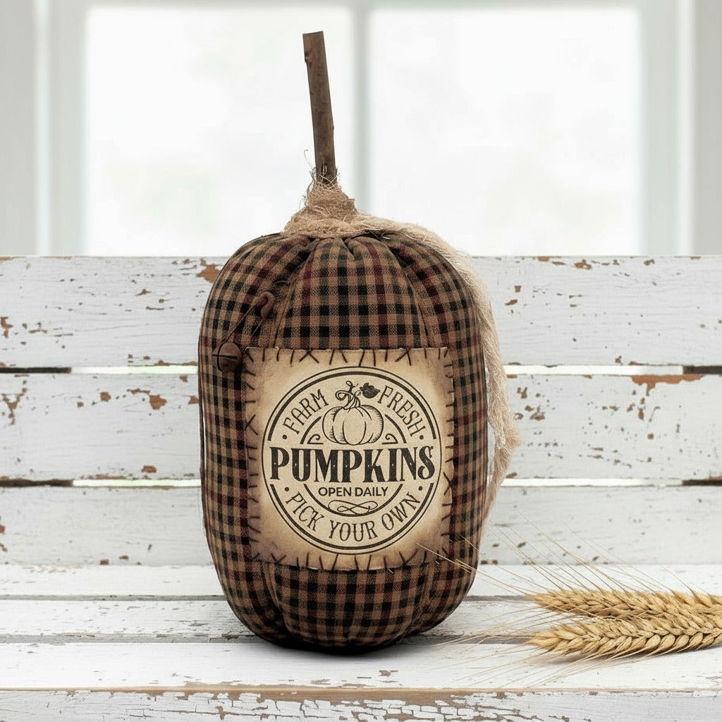 Decorative grungy homespun pumpkin with label
