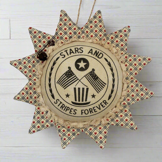 Primitive fabric sunflower ornament with a center printed with 'stars and stripes forever'