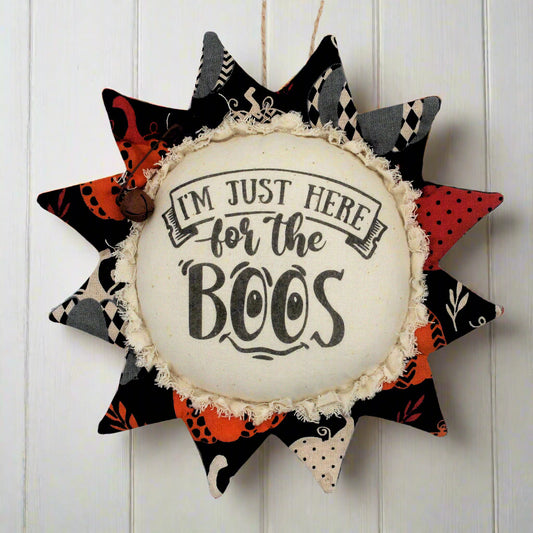 Primitive fabric sunflower ornament for Halloween with the text 'I'm just here for the boos'