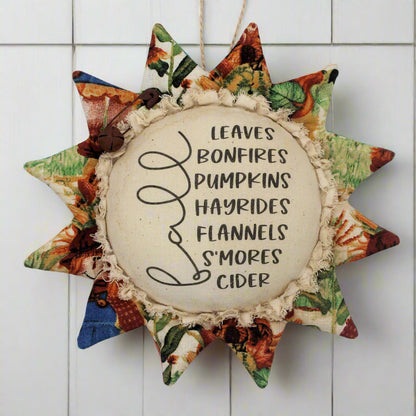 Primitive sunflower ornament with a list of fun stuff for autumn
