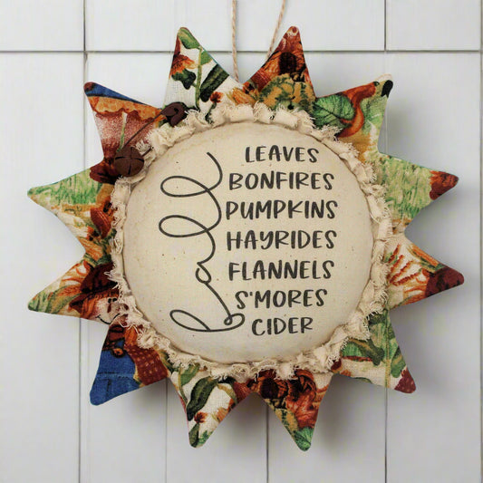 Primitive sunflower ornament with a list of fun stuff for autumn
