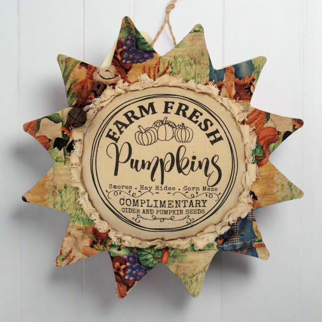 Primitive fabric sunflower ornament advertising for farm fresh pumpkins