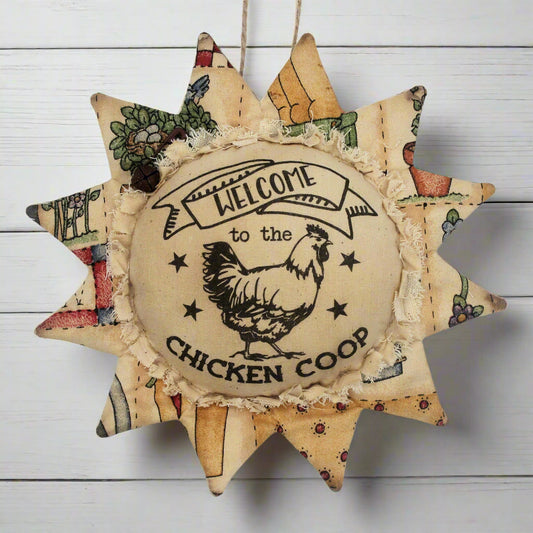 Primitive fabric sunflower ornament that reads 'welcome to the chicken coop'