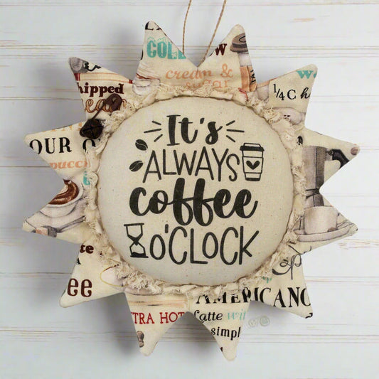 Primitive fabric sunflower ornament with the text 'It's always coffee o'clock'