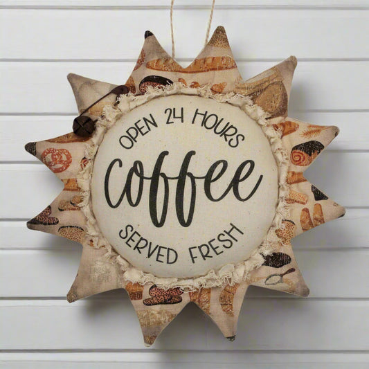 Primitive fabric sunflower ornament with an advertisement for coffee freshly served