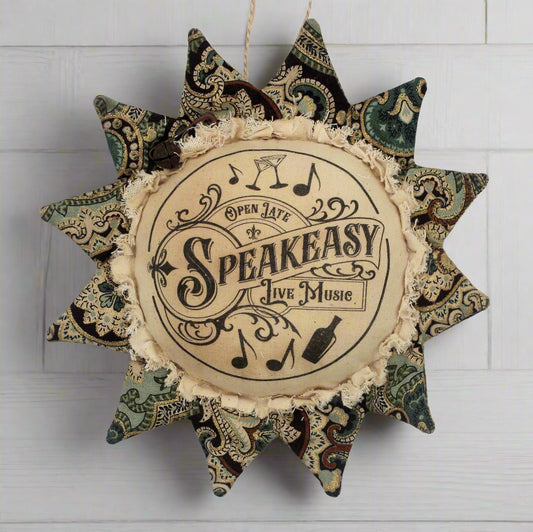 Decorative wall hanging with 'Speakeasy' text and vintage design on a white background
