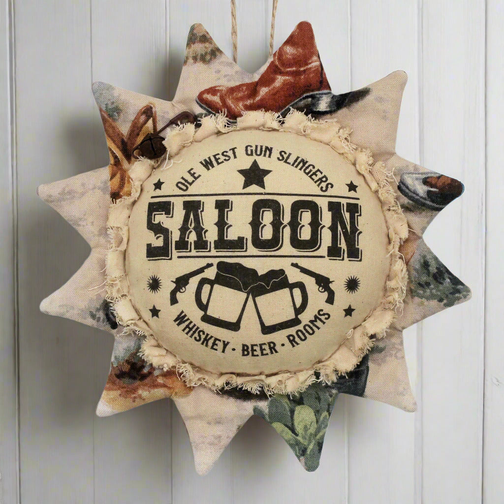 Primitive fabric sunflower ornament with an advertisement for a western saloon