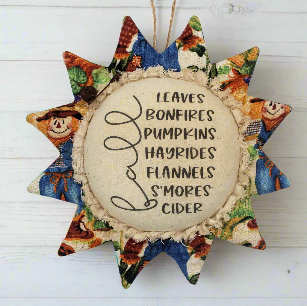 Primitive sunflower ornament with fall favorite activities text
