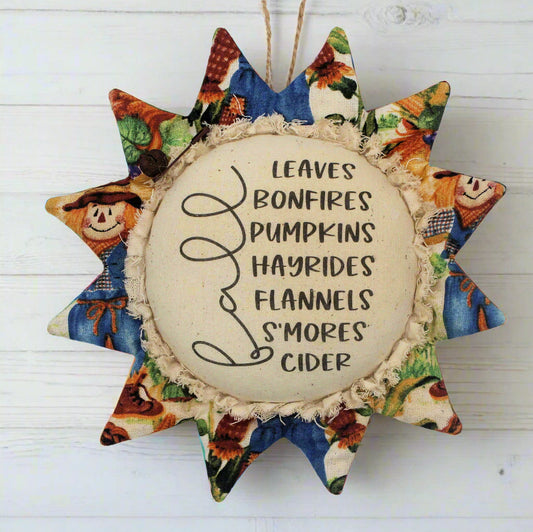 Primitive sunflower ornament with fall favorite activities text