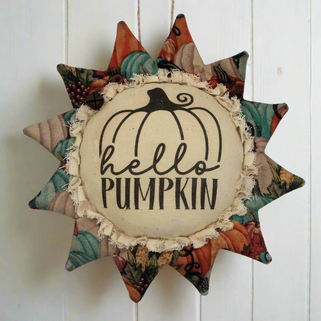 Decorative primitive sunflower ornament with 'hello pumpkin' text