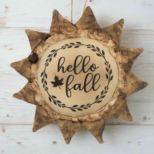 Primitive sunflower ornament with the greeting Hello Fall