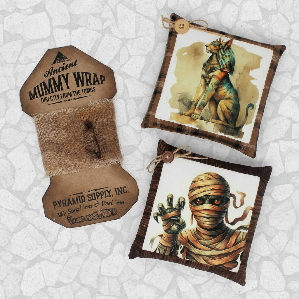 Decorative items with Egyptian-themed designs on a white background