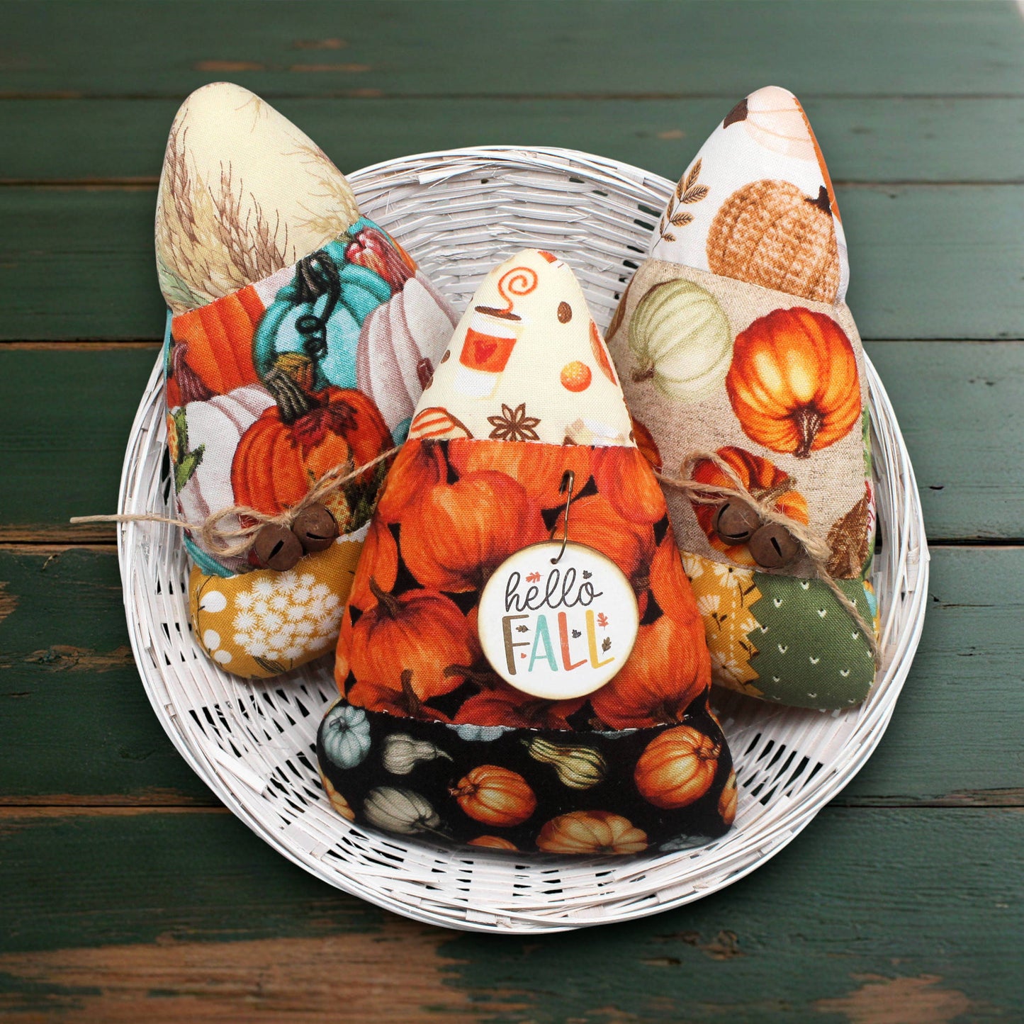 Set of three colorful candy corn bowl fillers in fall-themed fabrics
