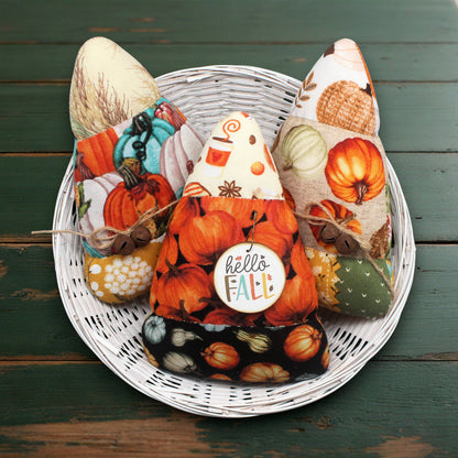 Set of three colorful candy corn bowl fillers in fall-themed fabrics