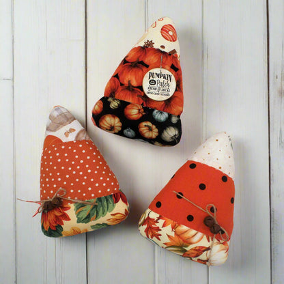 Set of three colorful fabric candy corn autumn bowl fillers