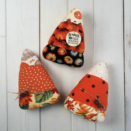 Set of three colorful fabric candy corn autumn bowl fillers