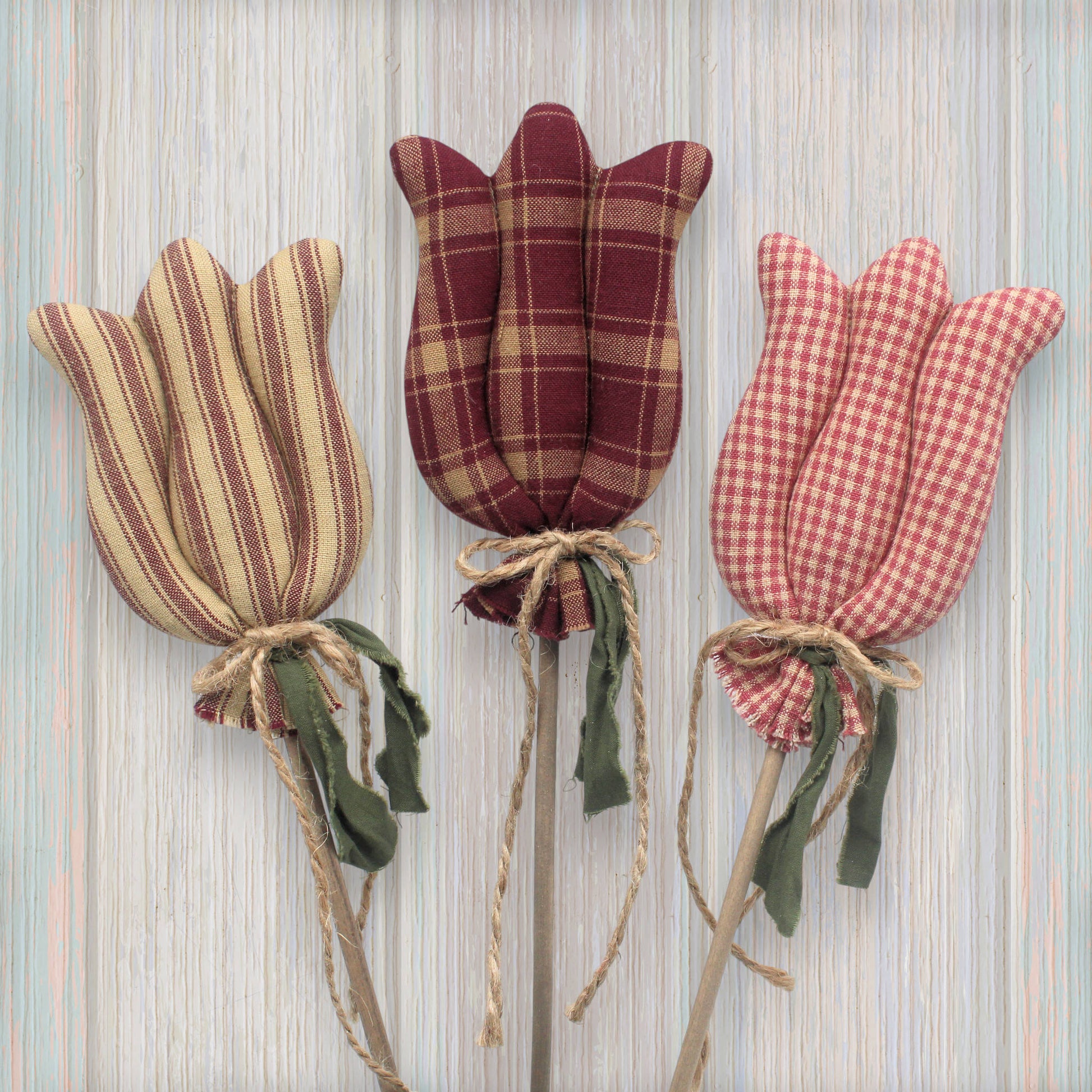 Set of three country primitive fabric tulip pokes in pink and burgundy homespun colors