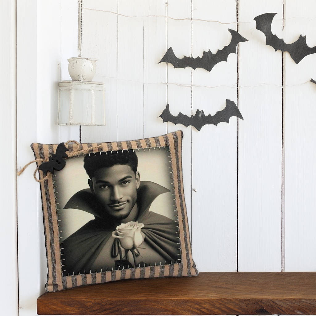 Decorative pillow with a person holding a rose on a wooden shelf with Halloween decorations.