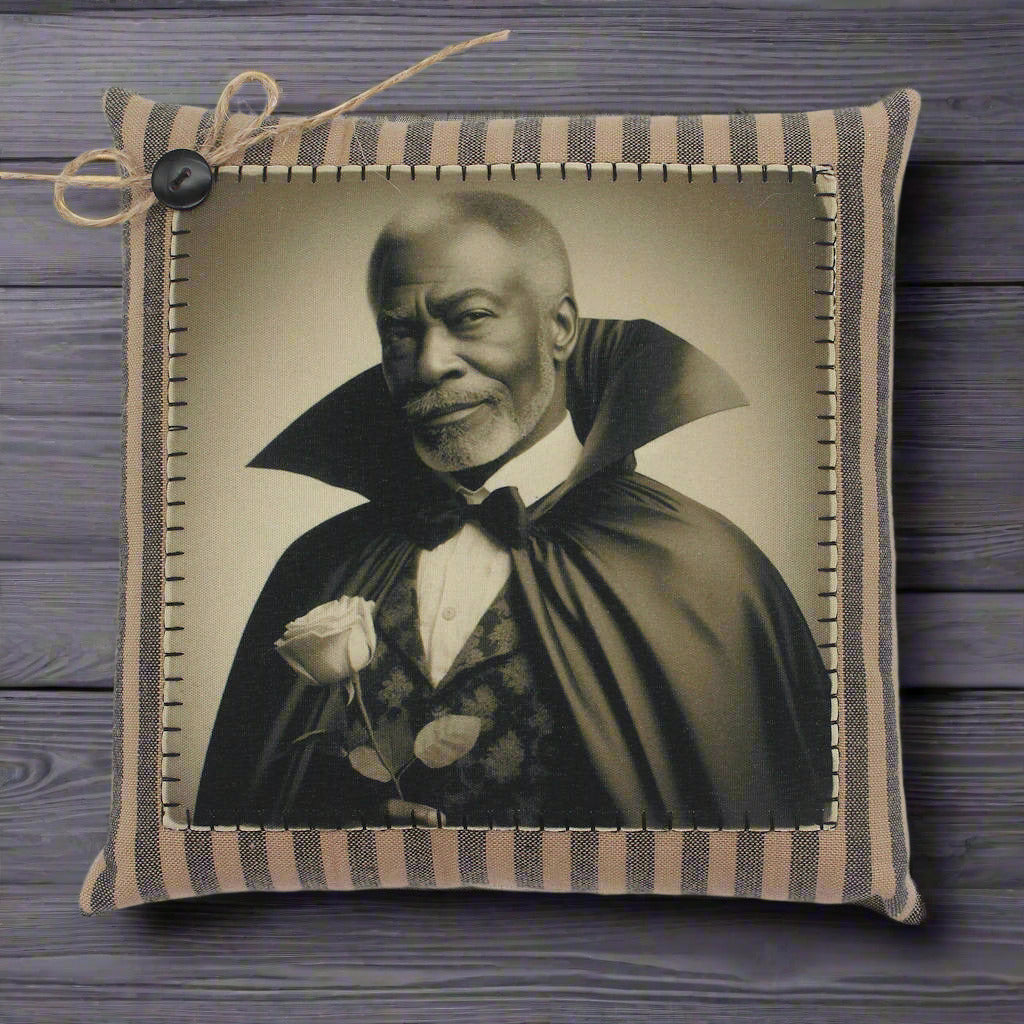 Decorative pillow with a vintage-style portrait of a handsome vampire in a cape