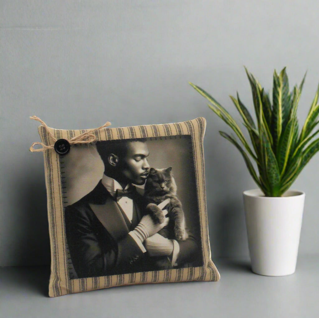 Decorative pillow with a vintage-style photo of a man holding a cat
