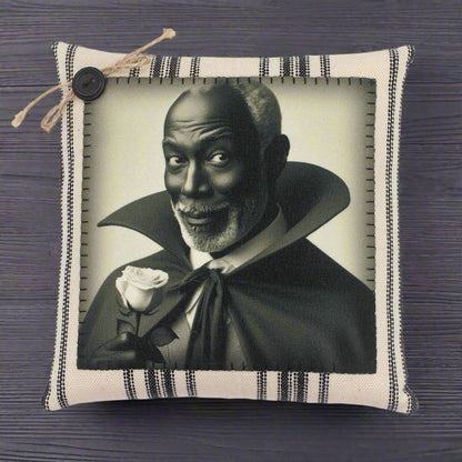 Pillow with a vampire in a black cape holding a rose on a white background