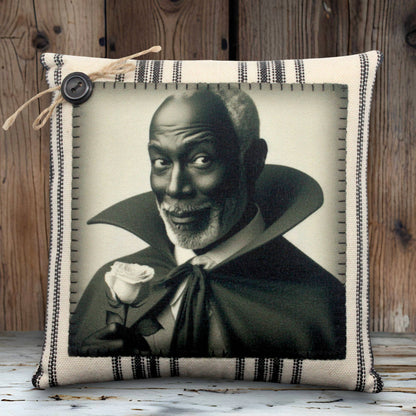 Pillow with a vampire in a black cape holding a rose on a white background