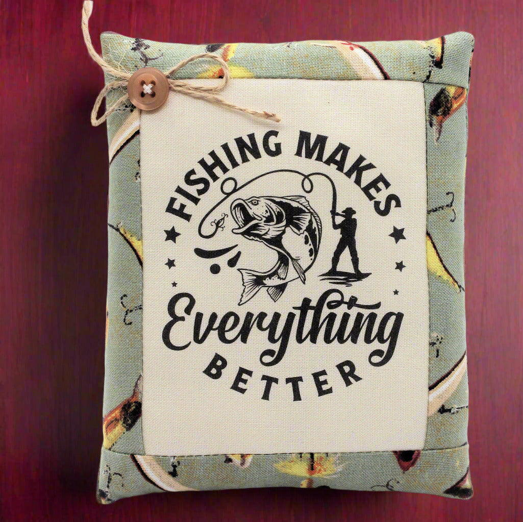 Small pillow bowl filler with fishing-themed text and graphics on a red background