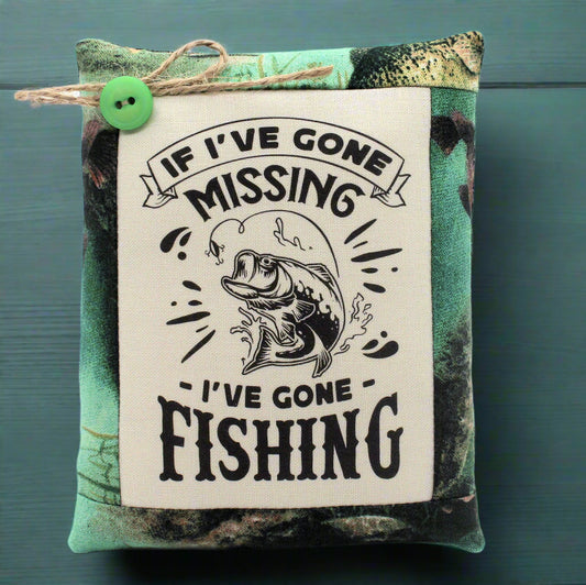 Mini pillow bowl filler with fishing-themed text and graphic on a camouflage background