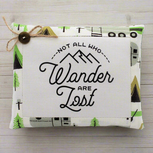 Mini pillow bowl filler with 'Not all who wander are lost' text and camping design.