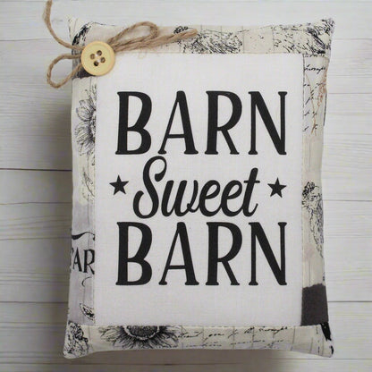 Fabric mini pillow bowl filler sign with 'Barn Sweet Barn' text on a white background