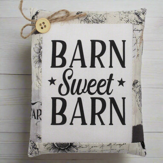 Fabric mini pillow bowl filler sign with 'Barn Sweet Barn' text on a white background