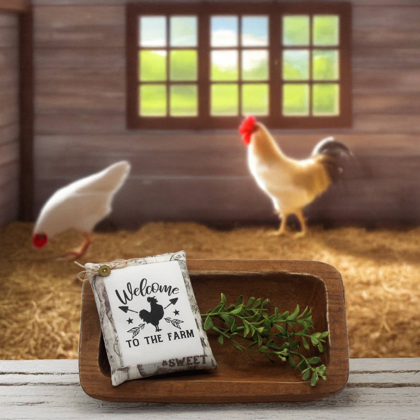 Decorative sign with 'Welcome to the Farm' text in a barn setting with chickens.