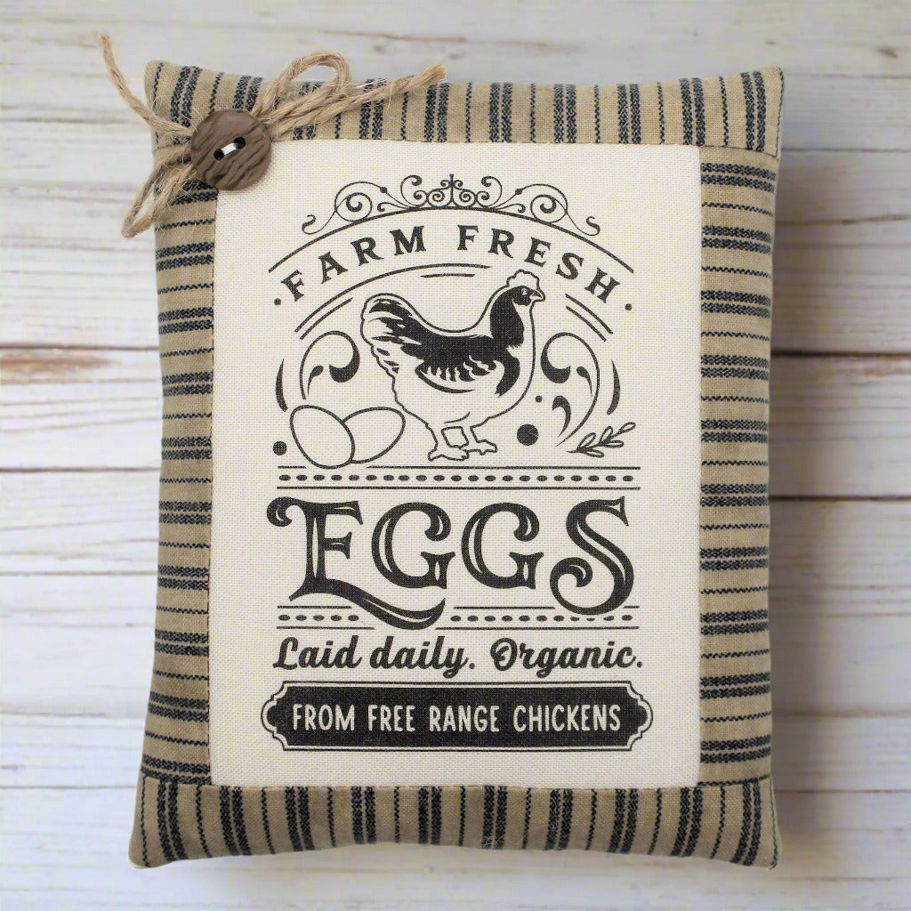 Decorative mini pillow tuck with 'Farm Fresh Eggs' text and chicken illustration