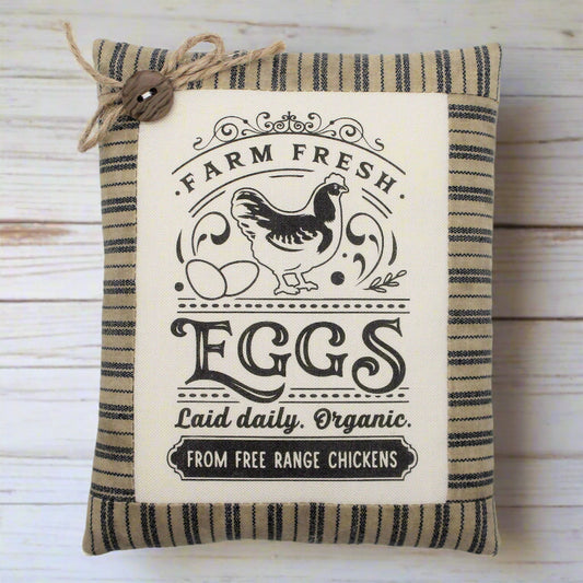 Decorative mini pillow tuck with 'Farm Fresh Eggs' text and chicken illustration