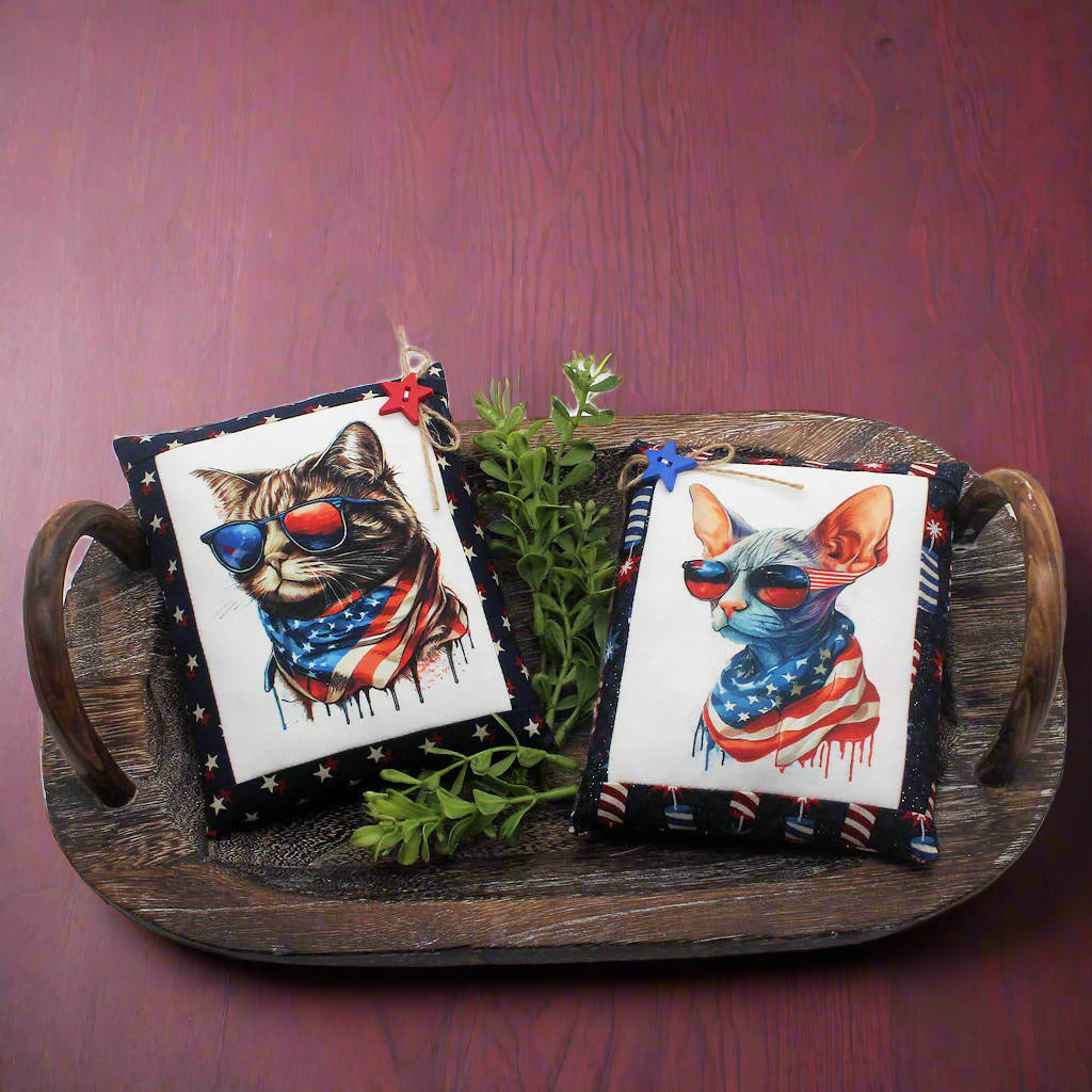 Set of mini pillow bowl fillers with images of cool patriotic cats in a wooden tray with greenery