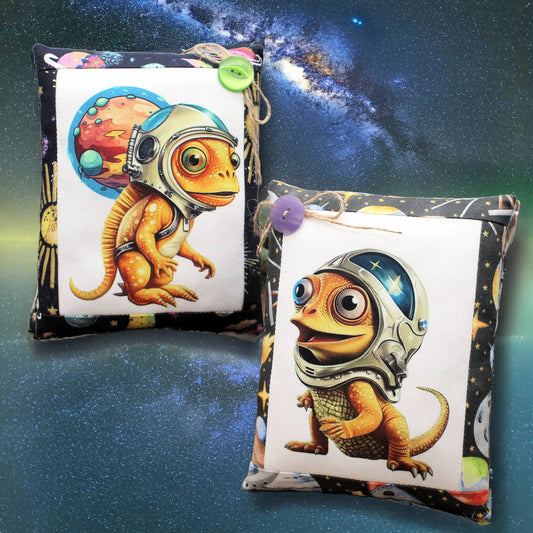 mini pillows with images of chameleon astronauts