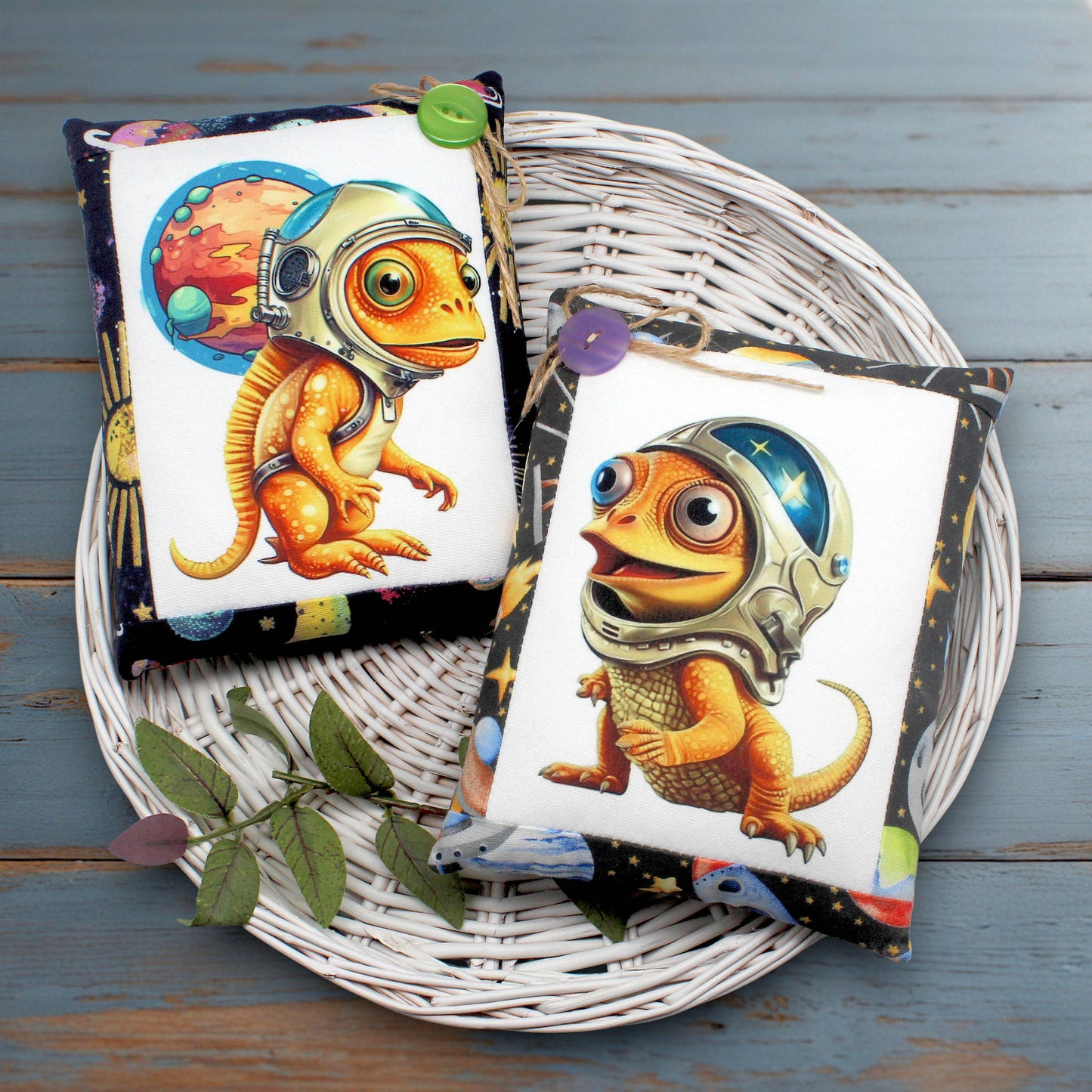 Set of two whimsical bowl fillers or pillow tucks with colorful designs of chameleon astronauts