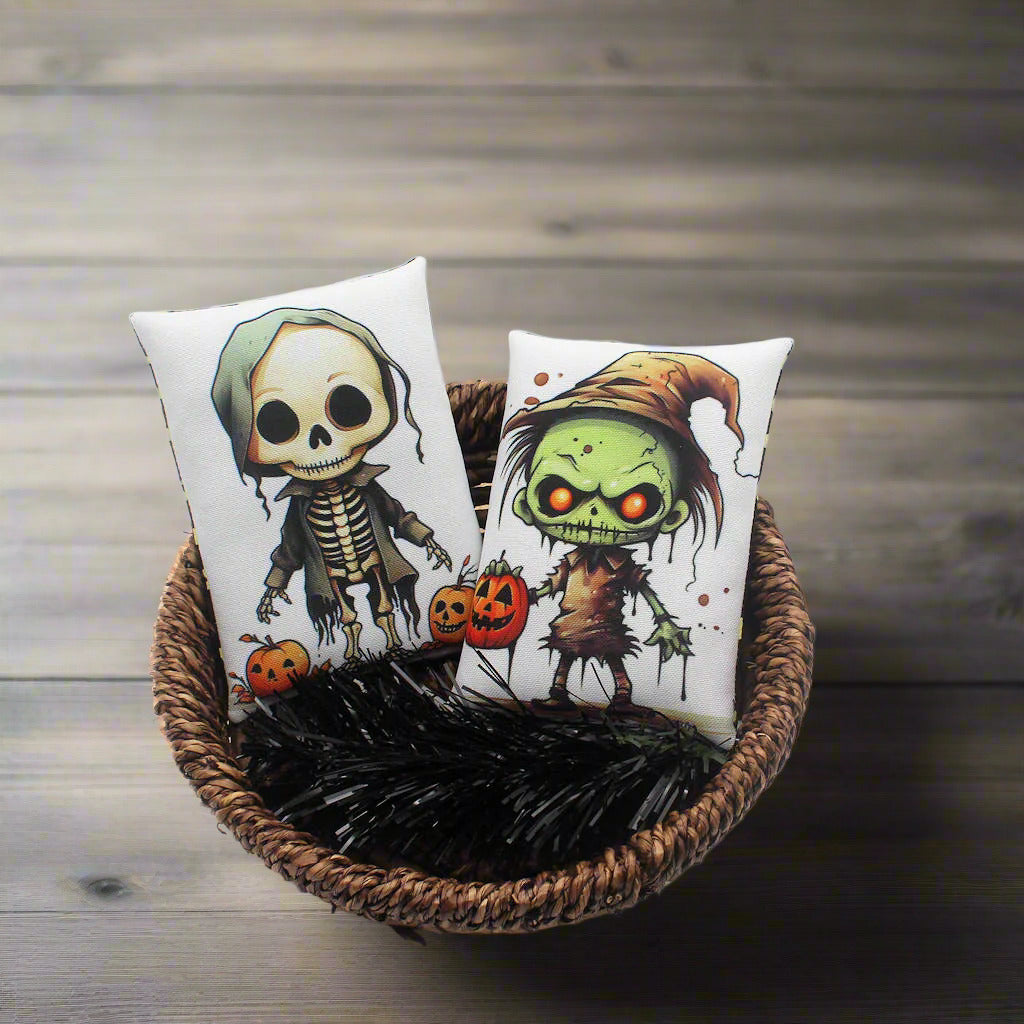 Set of two Halloween mini pillow bowl fillers with a cute zombie and skeleton