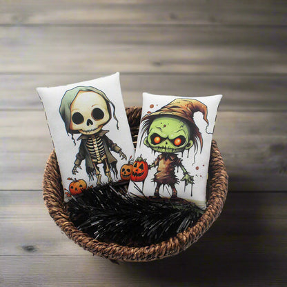 Set of two Halloween mini pillow bowl fillers with a cute zombie and skeleton