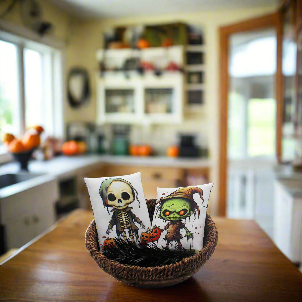 Set of two Halloween mini pillow bowl fillers with a cute zombie and skeleton