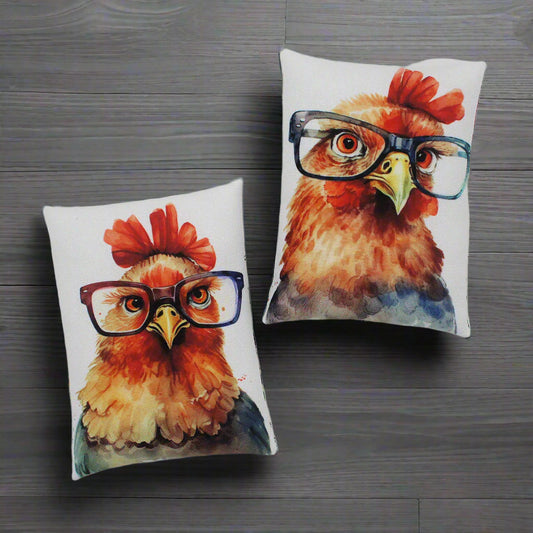Two mini pillow bowl fillers with a chicken design wearing glasses