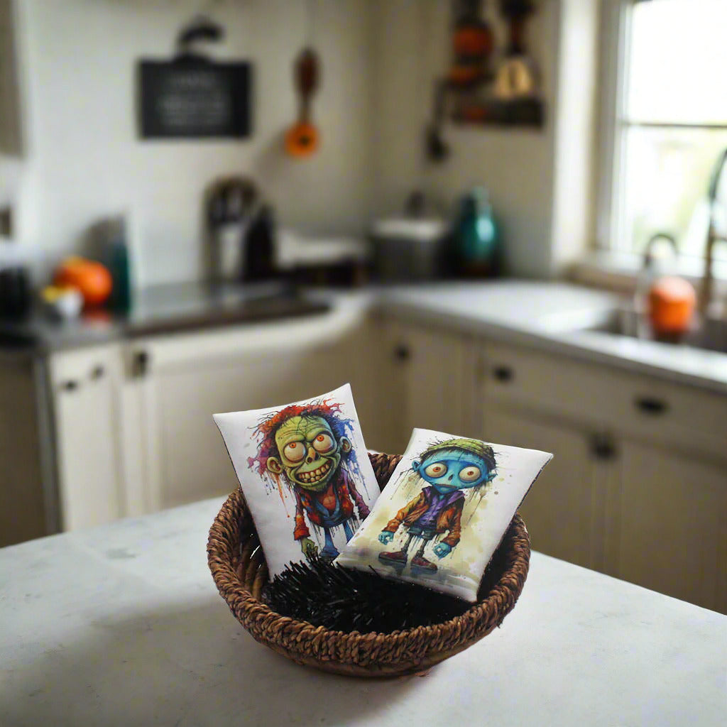 Set of two Halloween mini pillow bowl fillers with images of silly zombies