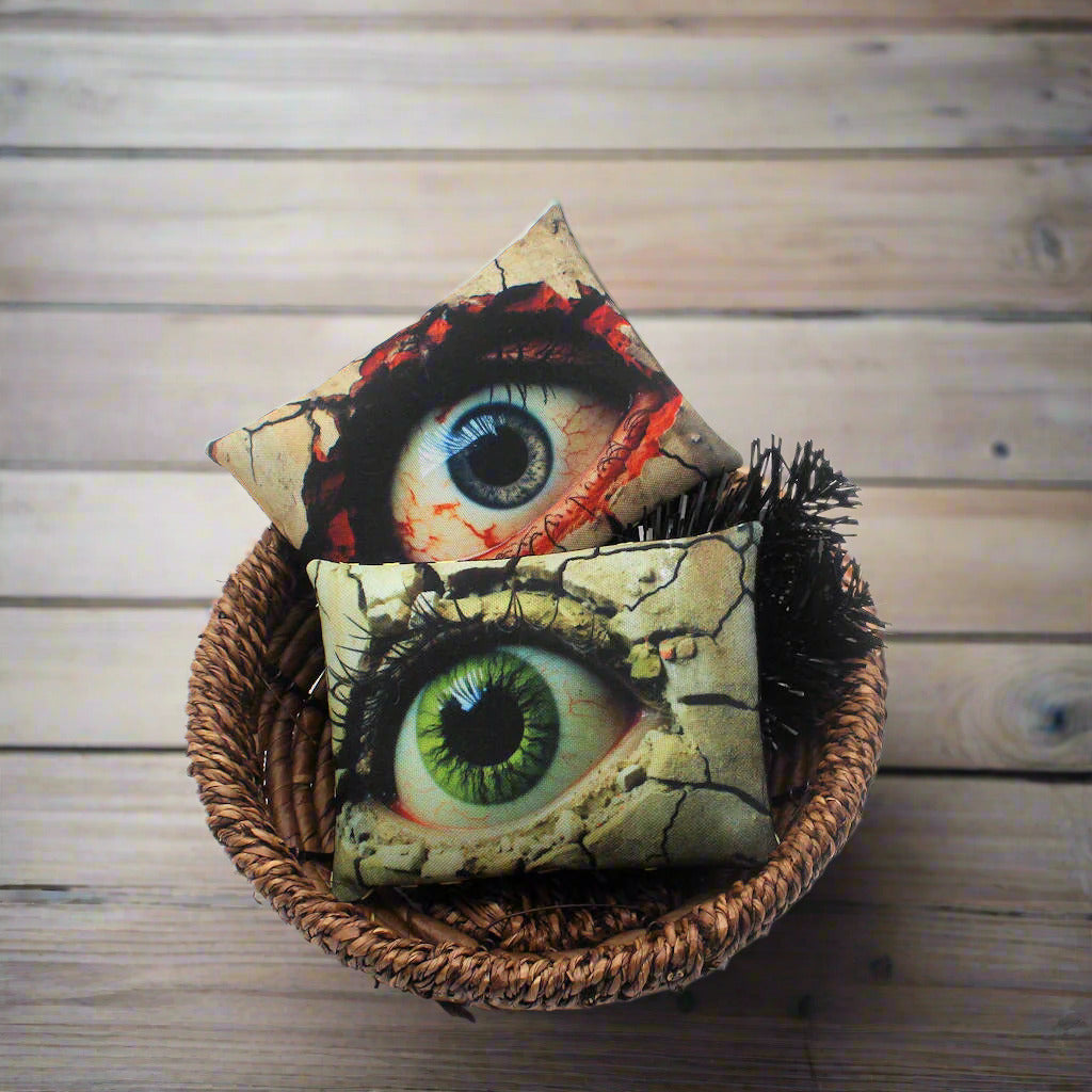 Set of two Halloween mini pillow bowl fillers with big creepy eyes