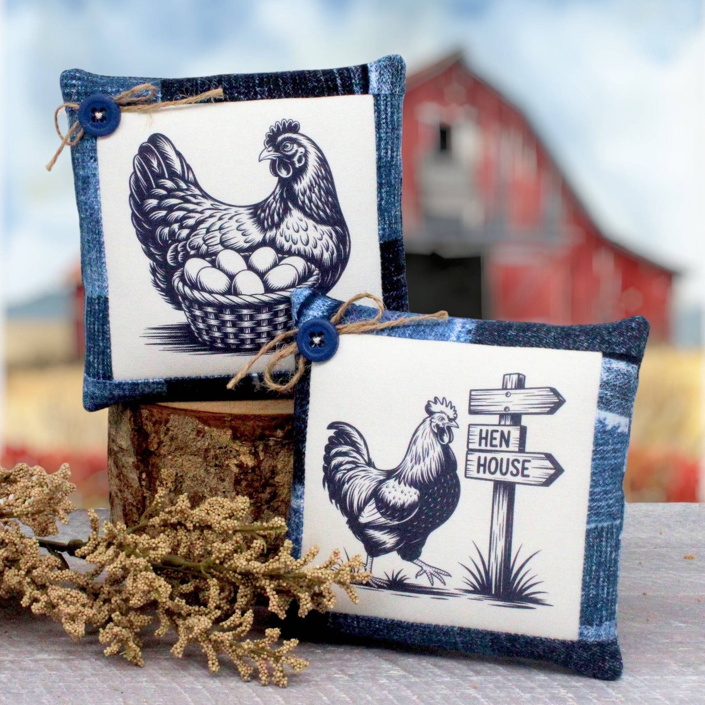 Two small decorative mini pillows with a rustic farm theme, featuring dark blue and white illustrations of a hen and rooster on a white background with blue denim-style borders. One pillow cover shows a hen with eggs in a basket, and the other shows a rooster next to a sign that reads 'HEN HOUSE'.