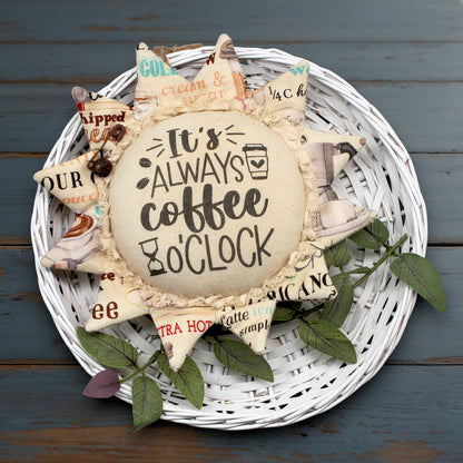 Primitive fabric sunflower ornament with the text 'It's always coffee o'clock'