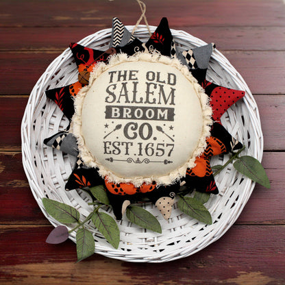 Primitive fabric sunflower ornament advertising for the Old Salem Broom Company