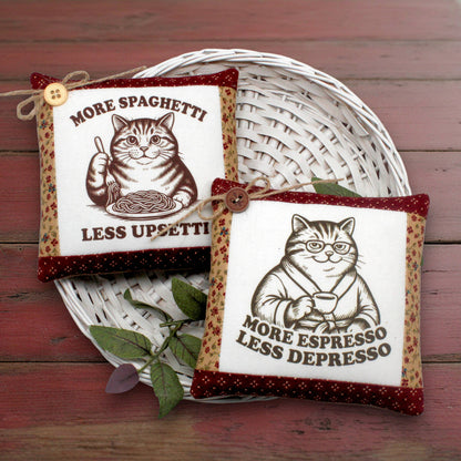 Set of two chunky cats miniature pillows bowl fillers, one loving espresso and the other demanding more spaghetti