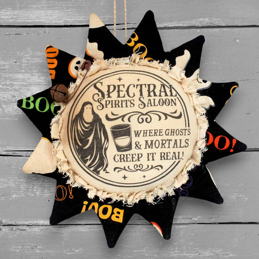 Handmade primitive fabric sunflower for Halloween advertising a saloon where ghosts and spirits creep it real!