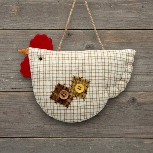 Decorative chicken-shaped wall hanging with plaid pattern and buttons on a wooden background
