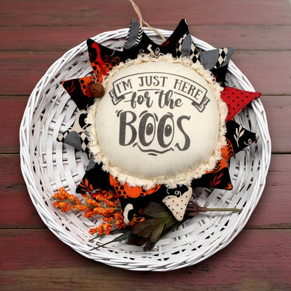Primitive fabric sunflower ornament for Halloween with the text 'I'm just here for the boos'